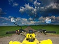 View from a quad bike in nature with amazing sky Royalty Free Stock Photo