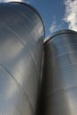 Two outside stainless steel fermentation wine tanks Royalty Free Stock Photo