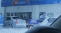 View of the queue at the gas station from the car window