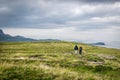 A view of Quirang hiils in the distance from the walking path from Staffin village to Staffin harbour and An Corran Beach. Two Royalty Free Stock Photo