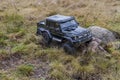 View of radio controlled model racing car Mercedes Benz on off-road background. Toys with remote control. Free time. Royalty Free Stock Photo