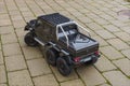 View of radio controlled model  racing car on off-road background. Toys with remote control. Free time. Children and adults conce Royalty Free Stock Photo