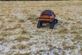 View of radio controlled model  racing car on off-road background. Toys with remote control. Free time. Royalty Free Stock Photo