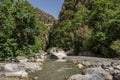 View of the Raganello River below il Ponte del diavolo pathway in Civita Royalty Free Stock Photo