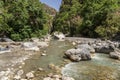 View of the Raganello River below il Ponte del diavolo pathway in Civita Royalty Free Stock Photo