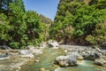 View of the Raganello River below il Ponte del diavolo pathway in Civita Royalty Free Stock Photo