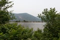 A View of Railroad Tracks and Storm King Mountain along the Hudson River in Cold Spring New York Royalty Free Stock Photo