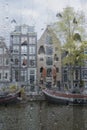 View Through a Rainy Window on the Amsterdam Canal Royalty Free Stock Photo