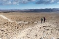 Trekking in Negev dramatic stone desert, Israel