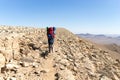 Trekking in Negev dramatic stone desert, Israel