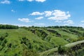 View ravine covered with greenery. Landscape valley with geological faults.