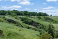 View ravine covered with greenery. Landscape valley with geological faults.