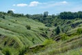 View ravine covered with greenery. Landscape valley with geological faults.