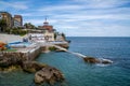 View of the Real Club Astur de Regatas Gijon country club and swimming pool on the shores of the Atlantic Ocean in Gijon Royalty Free Stock Photo