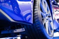 View of the rear of the car, details about the suspension. , blue super sports car wheels, luxury car Royalty Free Stock Photo