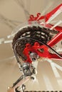 View of the red bicycle wheel, zooming in on the rear derailleur modes Royalty Free Stock Photo