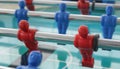 A view on red and blue plastic table football players Royalty Free Stock Photo