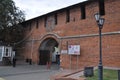 View of the red brick wall. Entrance arch to the territory of the Nizhny Novgorod Kremlin. Royalty Free Stock Photo