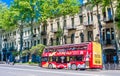 A view of a red Hop On Hop Off tourist bus at the Rustaveli Avenu. Tbilisi. Georgia