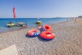 View of red inflatable rings, inviting enthusiasts for an exhilarating ride towed by a motorboat. Royalty Free Stock Photo
