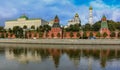 View of the red Kremlin wall, tower and golden onion domes of cathedrals over the Moskva River in Moscow, Russia Royalty Free Stock Photo