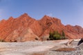 View of red mountains of Oytagh Canyon, along the Karakoram Highway from Kashgar to Tashkurgan, Xinjiang Uyghur Autonomous Region