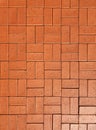 View on red paving stone road. Pavement of red granite texture. Royalty Free Stock Photo