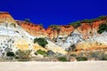 Red rocks on Rock Algarve Praia da Falesia in Portugal Royalty Free Stock Photo