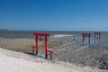 View of red torii gates at Oouo Shrine by sea, Tara, Saga Royalty Free Stock Photo
