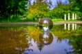 Summer Lensball Reflections In A Puddle Royalty Free Stock Photo