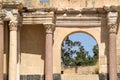 View through renovated arched doorway to ruins of Beit She`an Royalty Free Stock Photo