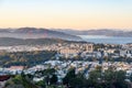 View of a residential district of San Francisco at sunset. The Golden Gate Bridge and the bay are in background. Royalty Free Stock Photo