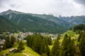 View of resort Zermatt on Alpine valley landscape, mountain, green meadow, coniferous forest Royalty Free Stock Photo