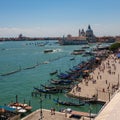 View from the restaurant on the cityscape of Venice and Grand Canal with Santa Maria della Salute church.