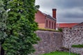 View of restored, fortifications built of large granite stones one a cloudy day Royalty Free Stock Photo