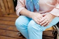 View of retired woman sitting and having knee pain Royalty Free Stock Photo