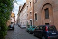 View of retro cars on street of Trastevere is the 13th district of Rome