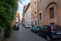 View of retro cars on street of Trastevere is the 13th district of Rome