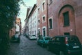 View of retro cars on street of Trastevere is the 13th district of Rome