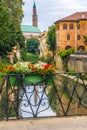 View of Retrone river and the clock tower of Vicenza, Italy Royalty Free Stock Photo