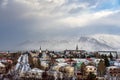 View of Reykjavik from the hill with snowy mountains in winter Royalty Free Stock Photo