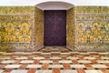 View of rich tile work at landmark Royal Alcazar building in Seville, Spain.