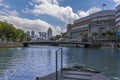 A view from a river boat across a basin on the Singapore river towards the Anderson Bridge in Singapore, Asia Royalty Free Stock Photo