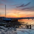 View on River Coquet at Amble on the coast of Northumberland at sunset. Royalty Free Stock Photo