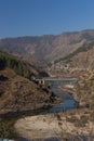 View of a river flowing through a narrow valley