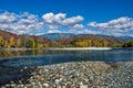 View of the river and the hills with stony shore Royalty Free Stock Photo