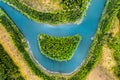 View of the river and the island like a smile from a bird`s eye view. Forest zone with a river in Belarus Royalty Free Stock Photo