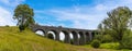 A view from beside the River Learn of the abandoned viaduct near Catesby, Northamptonshire, UK Royalty Free Stock Photo