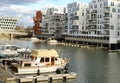 View of river Main and 30-story skyscraper Westhafen tower, modern residential buildings, Gutleitviertel district, boats and Royalty Free Stock Photo