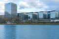 View of river Main and Westhafen tower, modern residential buildings, 30-story skyscraper Westhafen Tower in Gutleitviertel Royalty Free Stock Photo